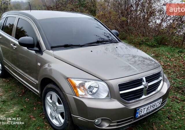 Бежевый Додж Калибер, объемом двигателя 2 л и пробегом 143 тыс. км за 9500 $, фото 1 на Automoto.ua