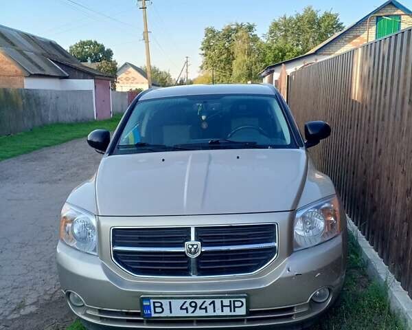 Бежевый Додж Калибер, объемом двигателя 2 л и пробегом 145 тыс. км за 7000 $, фото 1 на Automoto.ua