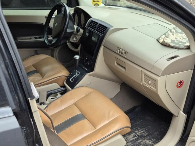 Чорний Додж Caliber, об'ємом двигуна 2 л та пробігом 268 тис. км за 5721 $, фото 1 на Automoto.ua