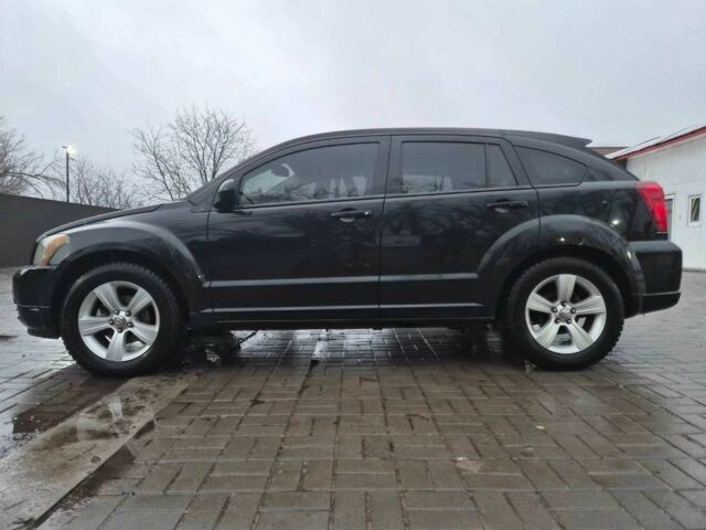 Чорний Додж Caliber, об'ємом двигуна 2.4 л та пробігом 177 тис. км за 7899 $, фото 1 на Automoto.ua