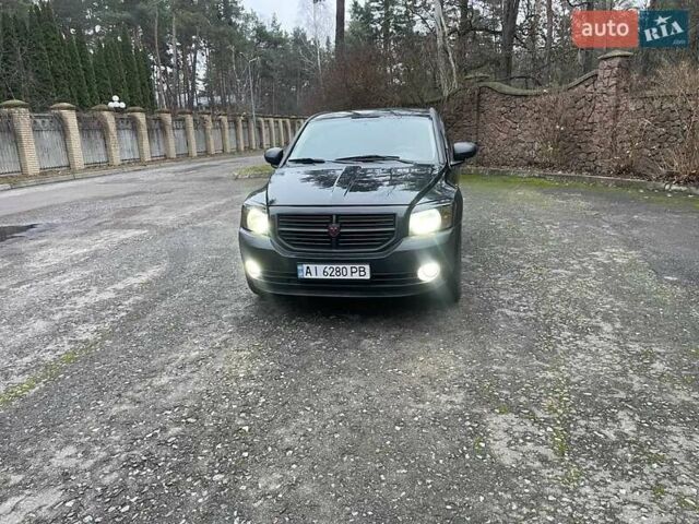 Черный Додж Калибер, объемом двигателя 1.97 л и пробегом 210 тыс. км за 5350 $, фото 1 на Automoto.ua