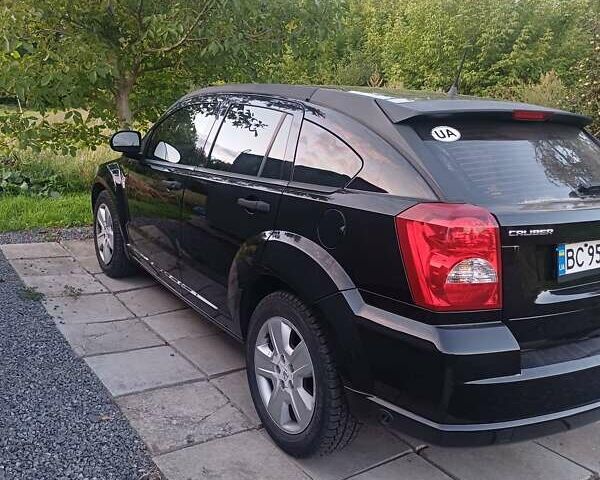 Черный Додж Калибер, объемом двигателя 1.8 л и пробегом 250 тыс. км за 6000 $, фото 1 на Automoto.ua