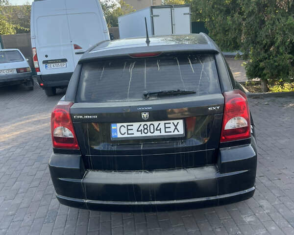 Черный Додж Калибер, объемом двигателя 1.8 л и пробегом 230 тыс. км за 5200 $, фото 1 на Automoto.ua