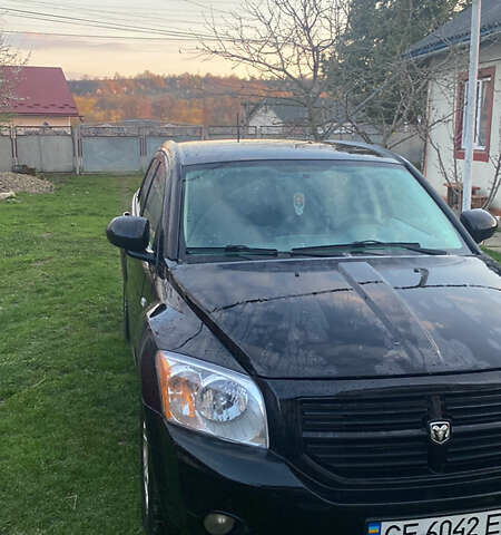 Черный Додж Калибер, объемом двигателя 1.97 л и пробегом 230 тыс. км за 5800 $, фото 1 на Automoto.ua