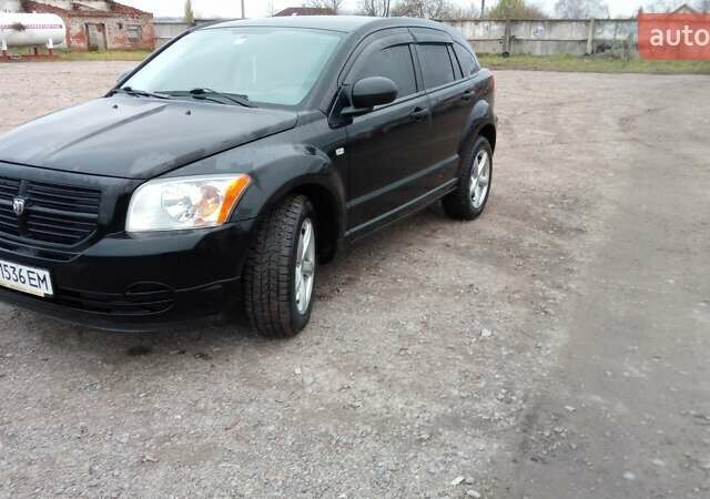 Чорний Додж Caliber, об'ємом двигуна 1.8 л та пробігом 220 тис. км за 5900 $, фото 1 на Automoto.ua