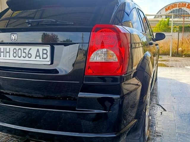 Черный Додж Калибер, объемом двигателя 2 л и пробегом 316 тыс. км за 7500 $, фото 1 на Automoto.ua
