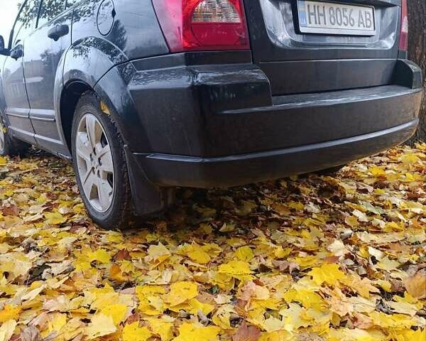 Черный Додж Калибер, объемом двигателя 2 л и пробегом 263 тыс. км за 7500 $, фото 1 на Automoto.ua