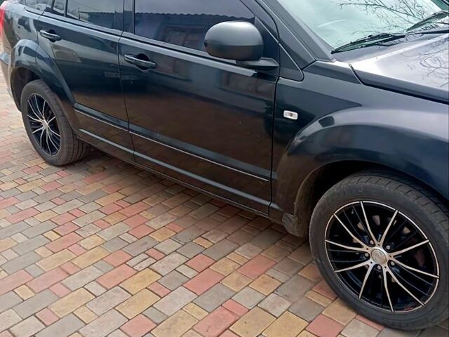 Чорний Додж Caliber, об'ємом двигуна 2 л та пробігом 270 тис. км за 7000 $, фото 1 на Automoto.ua