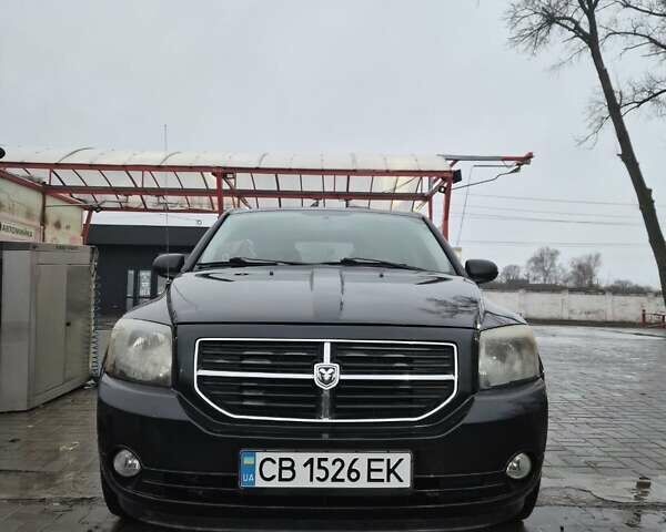 Черный Додж Калибер, объемом двигателя 2.36 л и пробегом 177 тыс. км за 7899 $, фото 1 на Automoto.ua