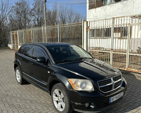 Черный Додж Калибер, объемом двигателя 2 л и пробегом 205 тыс. км за 6500 $, фото 1 на Automoto.ua