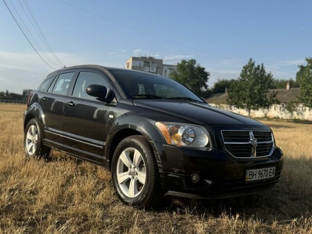 Черный Додж Калибер, объемом двигателя 2 л и пробегом 95 тыс. км за 7960 $, фото 1 на Automoto.ua