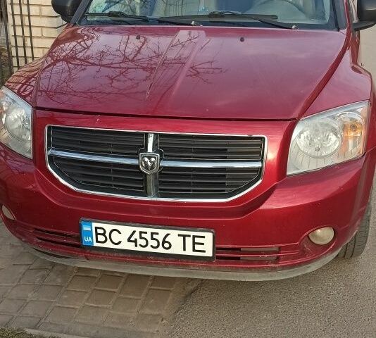 Красный Додж Калибер, объемом двигателя 2 л и пробегом 262 тыс. км за 5000 $, фото 1 на Automoto.ua