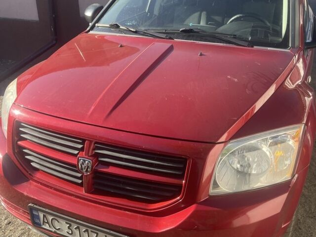 Красный Додж Калибер, объемом двигателя 2 л и пробегом 257 тыс. км за 5500 $, фото 1 на Automoto.ua