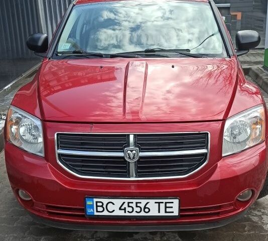 Красный Додж Калибер, объемом двигателя 2 л и пробегом 250 тыс. км за 5700 $, фото 1 на Automoto.ua