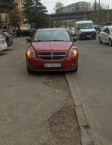 Красный Додж Калибер, объемом двигателя 2 л и пробегом 240 тыс. км за 5700 $, фото 1 на Automoto.ua