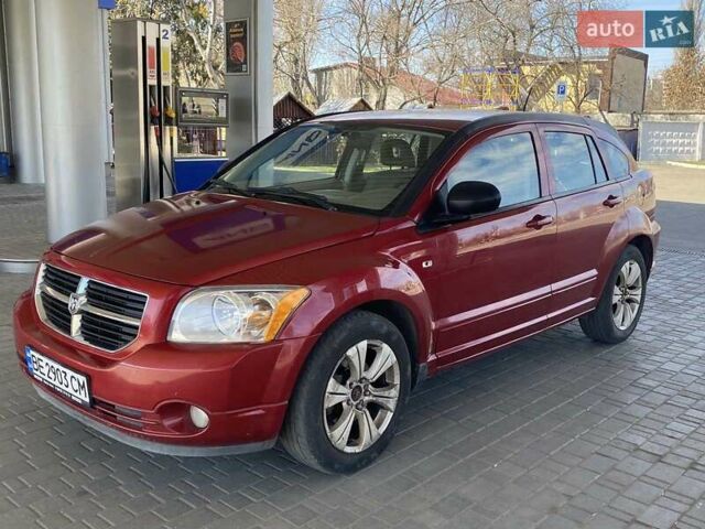 Красный Додж Калибер, объемом двигателя 2 л и пробегом 206 тыс. км за 6900 $, фото 1 на Automoto.ua