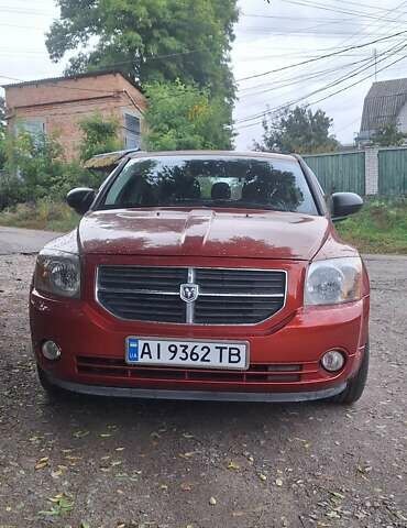 Красный Додж Калибер, объемом двигателя 2 л и пробегом 204 тыс. км за 5500 $, фото 1 на Automoto.ua