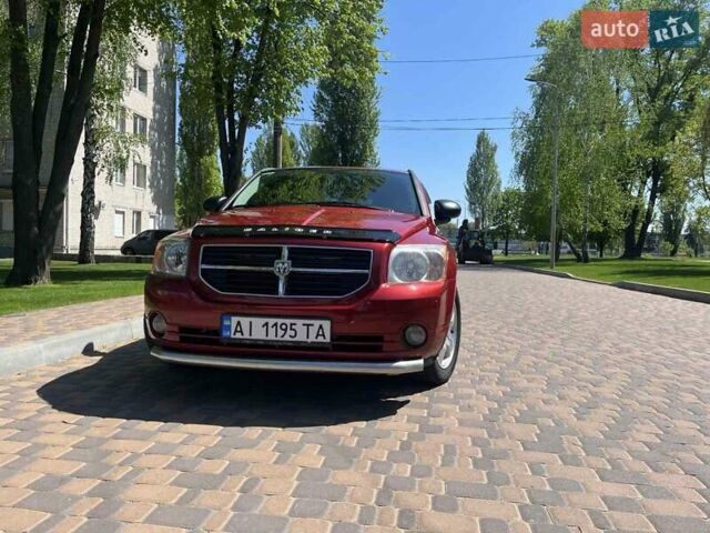 Красный Додж Калибер, объемом двигателя 2 л и пробегом 165 тыс. км за 7100 $, фото 1 на Automoto.ua