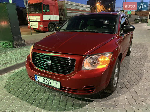 Красный Додж Калибер, объемом двигателя 2 л и пробегом 219 тыс. км за 7300 $, фото 1 на Automoto.ua
