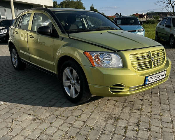 Желтый Додж Калибер, объемом двигателя 2 л и пробегом 175 тыс. км за 7400 $, фото 1 на Automoto.ua