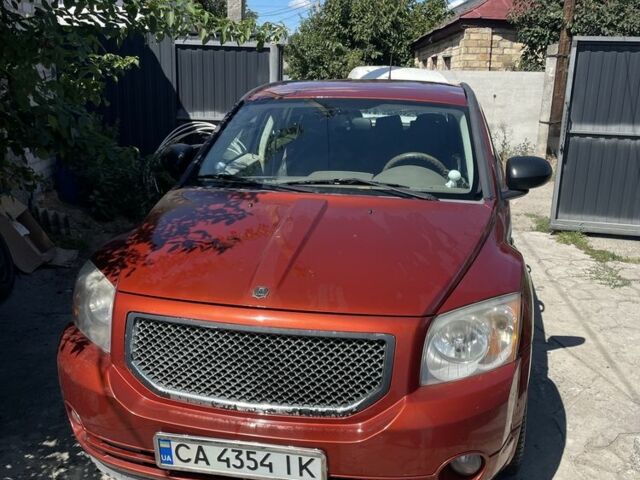 Помаранчевий Додж Caliber, об'ємом двигуна 2 л та пробігом 135 тис. км за 5800 $, фото 1 на Automoto.ua