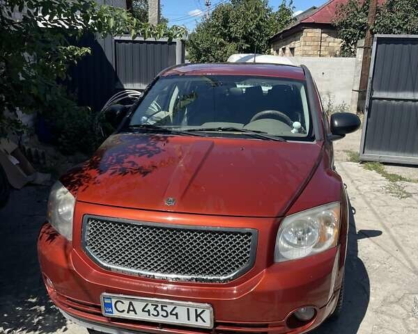 Оранжевый Додж Калибер, объемом двигателя 2 л и пробегом 135 тыс. км за 5600 $, фото 1 на Automoto.ua