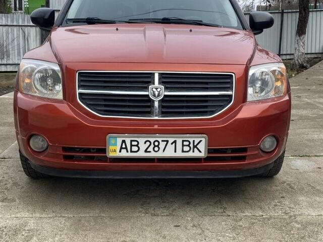 Оранжевый Додж Калибер, объемом двигателя 2 л и пробегом 294 тыс. км за 7800 $, фото 1 на Automoto.ua