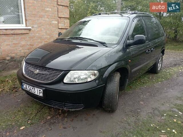 Черный Додж Караван, объемом двигателя 2.5 л и пробегом 360 тыс. км за 4700 $, фото 1 на Automoto.ua