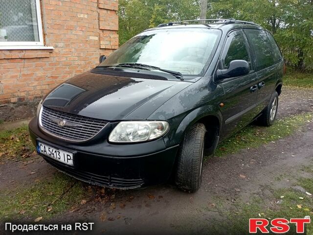 Черный Додж Караван, объемом двигателя 2.5 л и пробегом 316 тыс. км за 5000 $, фото 1 на Automoto.ua