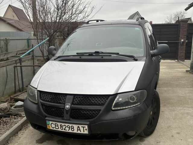 Черный Додж Караван, объемом двигателя 2.5 л и пробегом 393 тыс. км за 4000 $, фото 1 на Automoto.ua
