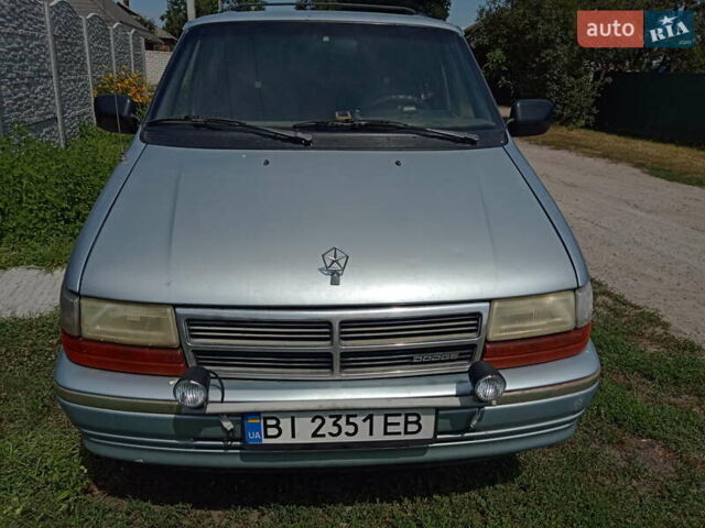 Синий Додж Караван, объемом двигателя 3 л и пробегом 400 тыс. км за 2000 $, фото 1 на Automoto.ua