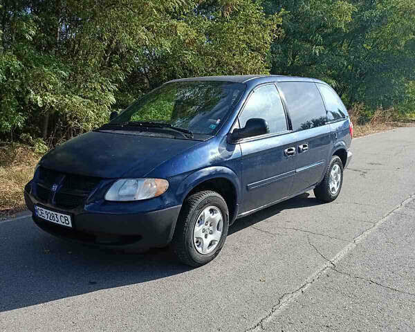 Синий Додж Караван, объемом двигателя 2.4 л и пробегом 291 тыс. км за 3200 $, фото 1 на Automoto.ua