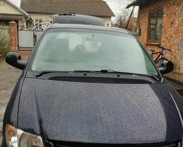 Синий Додж Караван, объемом двигателя 3.3 л и пробегом 200 тыс. км за 5100 $, фото 1 на Automoto.ua