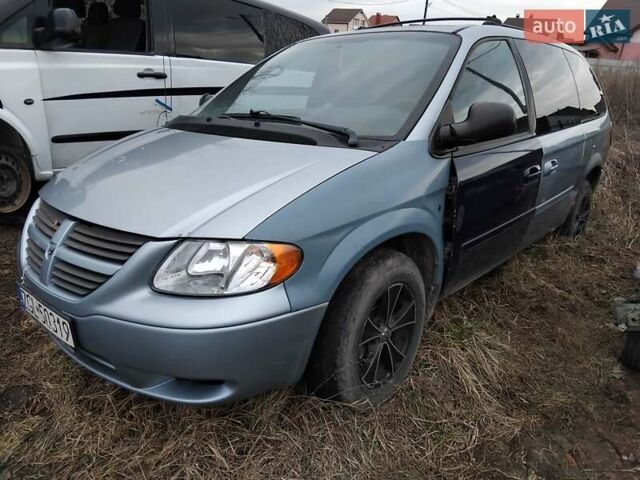 Синий Додж Караван, объемом двигателя 3.3 л и пробегом 270 тыс. км за 950 $, фото 1 на Automoto.ua