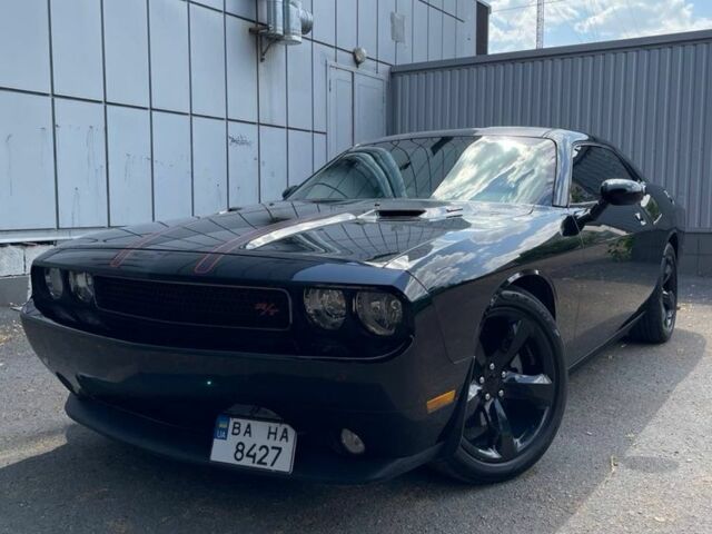 Черный Додж Челенджер, объемом двигателя 5.7 л и пробегом 125 тыс. км за 19000 $, фото 1 на Automoto.ua