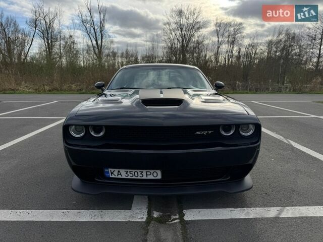 Чорний Додж Challenger, об'ємом двигуна 5.65 л та пробігом 136 тис. км за 23999 $, фото 1 на Automoto.ua