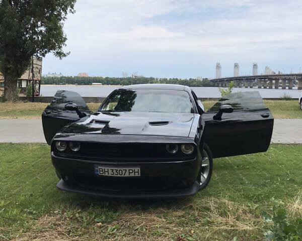 Черный Додж Челенджер, объемом двигателя 3.6 л и пробегом 124 тыс. км за 19500 $, фото 1 на Automoto.ua