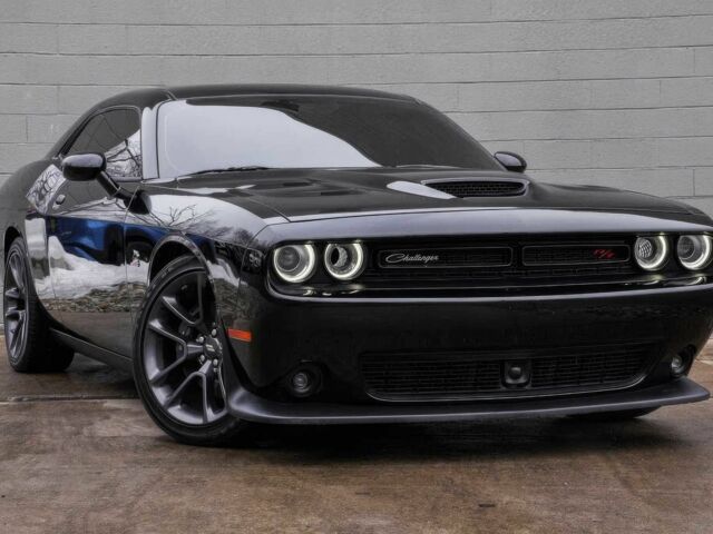 Чорний Додж Challenger, об'ємом двигуна 6.4 л та пробігом 56 тис. км за 10200 $, фото 1 на Automoto.ua