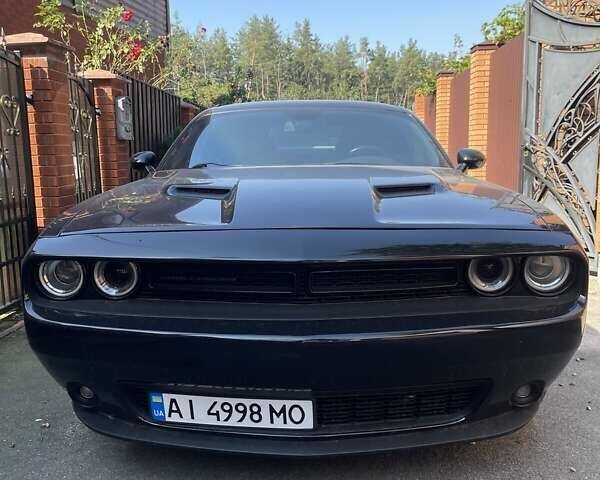 Черный Додж Челенджер, объемом двигателя 3.6 л и пробегом 145 тыс. км за 18900 $, фото 1 на Automoto.ua