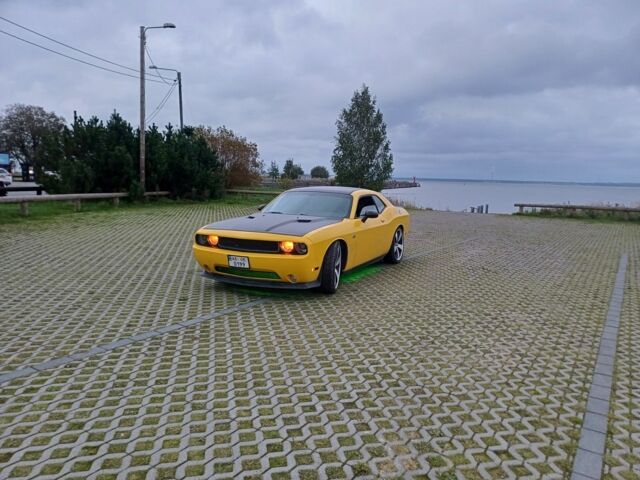 Красный Додж Челенджер, объемом двигателя 3.6 л и пробегом 260 тыс. км за 12500 $, фото 1 на Automoto.ua