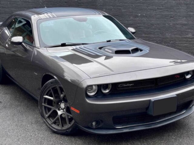 Серый Додж Челенджер, объемом двигателя 5.7 л и пробегом 76 тыс. км за 10200 $, фото 1 на Automoto.ua