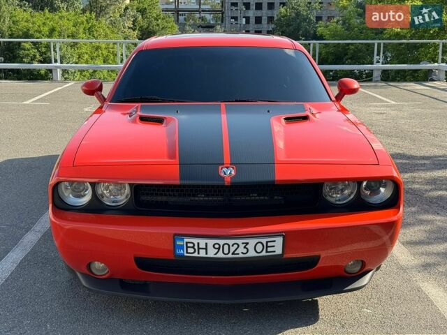 Помаранчевий Додж Challenger, об'ємом двигуна 6.06 л та пробігом 97 тис. км за 25900 $, фото 1 на Automoto.ua