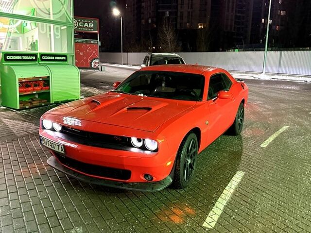 Оранжевый Додж Челенджер, объемом двигателя 5.7 л и пробегом 93 тыс. км за 28000 $, фото 1 на Automoto.ua