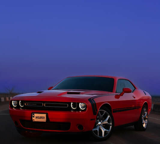 Оранжевый Додж Челенджер, объемом двигателя 3.6 л и пробегом 96 тыс. км за 18990 $, фото 1 на Automoto.ua