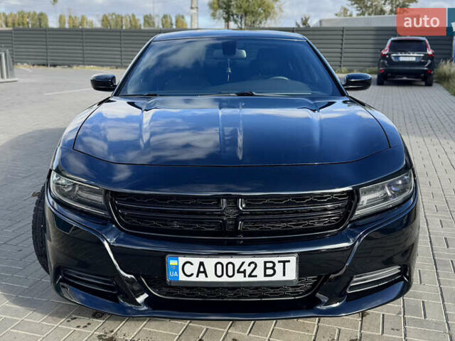 Черный Додж Чарджер, объемом двигателя 3.6 л и пробегом 208 тыс. км за 18300 $, фото 1 на Automoto.ua