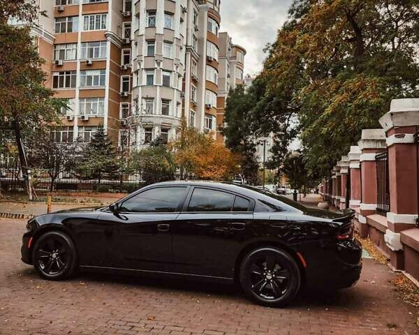 Черный Додж Чарджер, объемом двигателя 3.6 л и пробегом 160 тыс. км за 18900 $, фото 1 на Automoto.ua