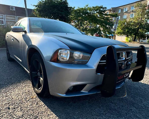 Серый Додж Чарджер, объемом двигателя 3.6 л и пробегом 156 тыс. км за 10000 $, фото 1 на Automoto.ua