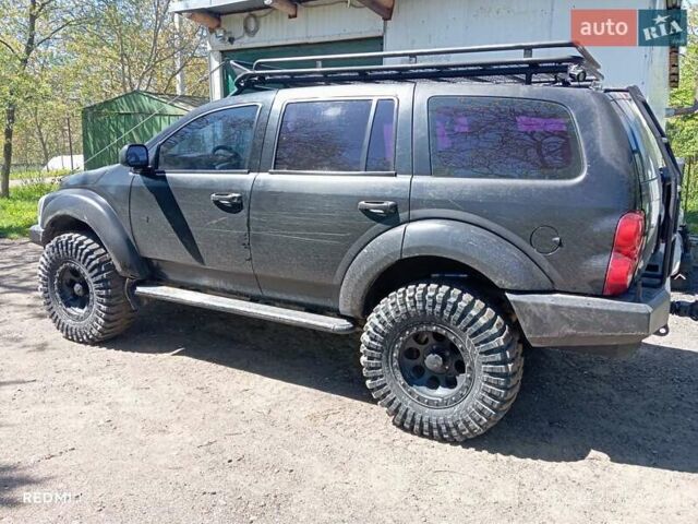 Чорний Додж Durango, об'ємом двигуна 5.7 л та пробігом 156 тис. км за 17300 $, фото 1 на Automoto.ua