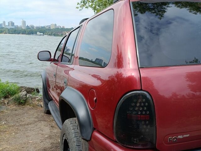 Красный Додж Дюранго, объемом двигателя 5 л и пробегом 352 тыс. км за 8500 $, фото 1 на Automoto.ua