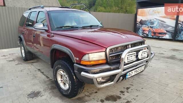 Красный Додж Дюранго, объемом двигателя 5.2 л и пробегом 185 тыс. км за 10000 $, фото 1 на Automoto.ua